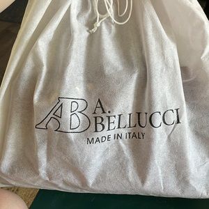 A Bellucci Genuine Leather tote purse with cross body strap